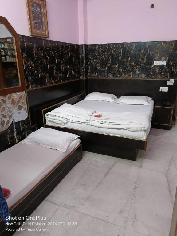Uma cama ou camas num quarto em Mother Palace