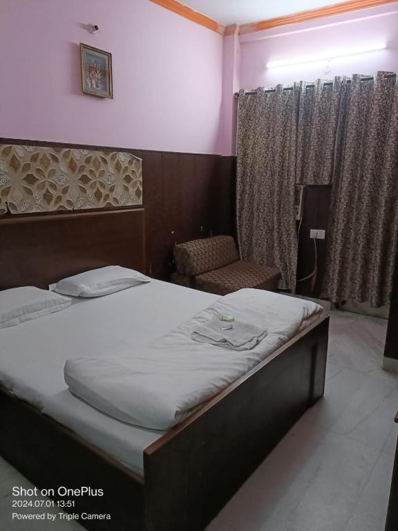 Uma cama ou camas num quarto em Mother Palace