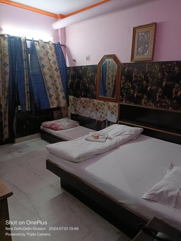 Uma cama ou camas num quarto em Mother Palace