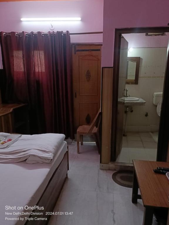 Uma cama ou camas num quarto em Mother Palace