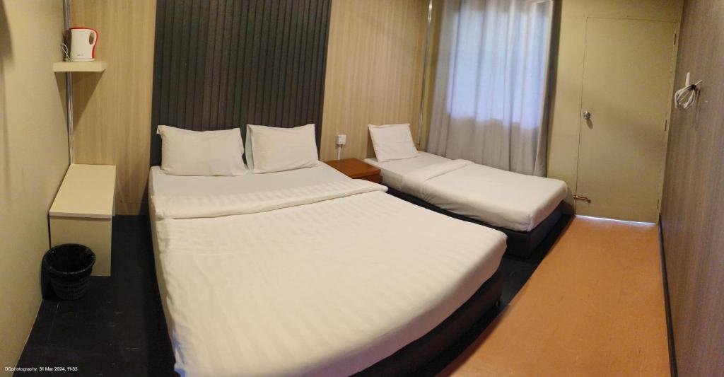 Postel nebo postele na pokoji v ubytování janice's villa