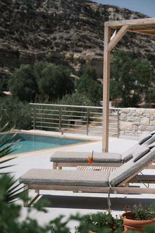 Bazén v ubytování Luxury Villas Ammos in Style nebo v jeho okolí