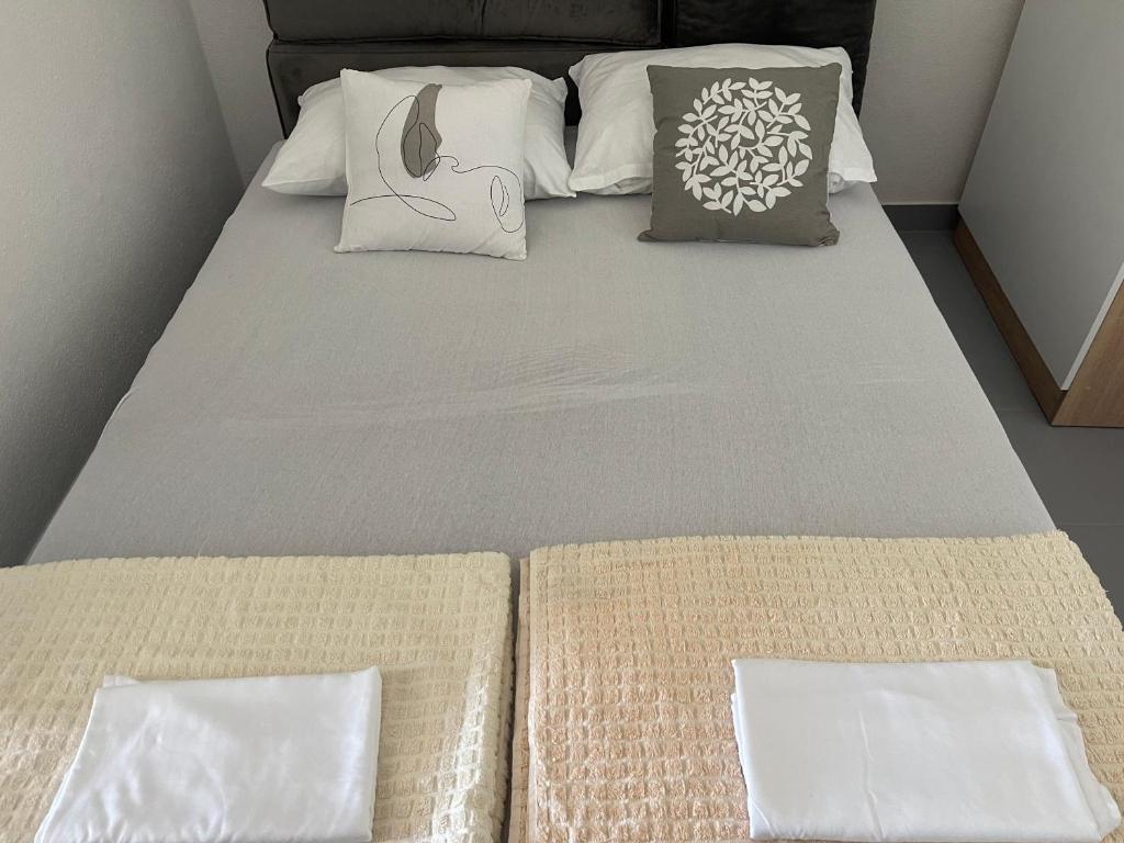 Ένα ή περισσότερα κρεβάτια σε δωμάτιο στο Seaside