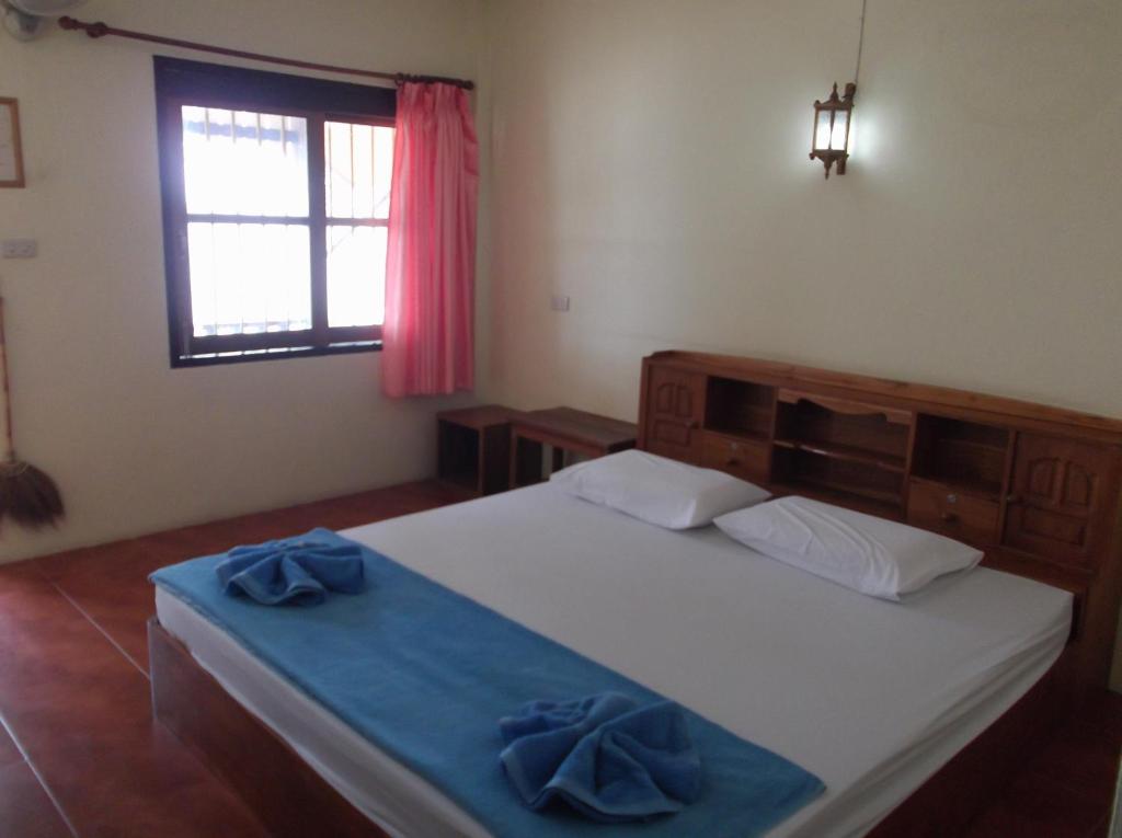 Postel nebo postele na pokoji v ubytování Lamai Resort