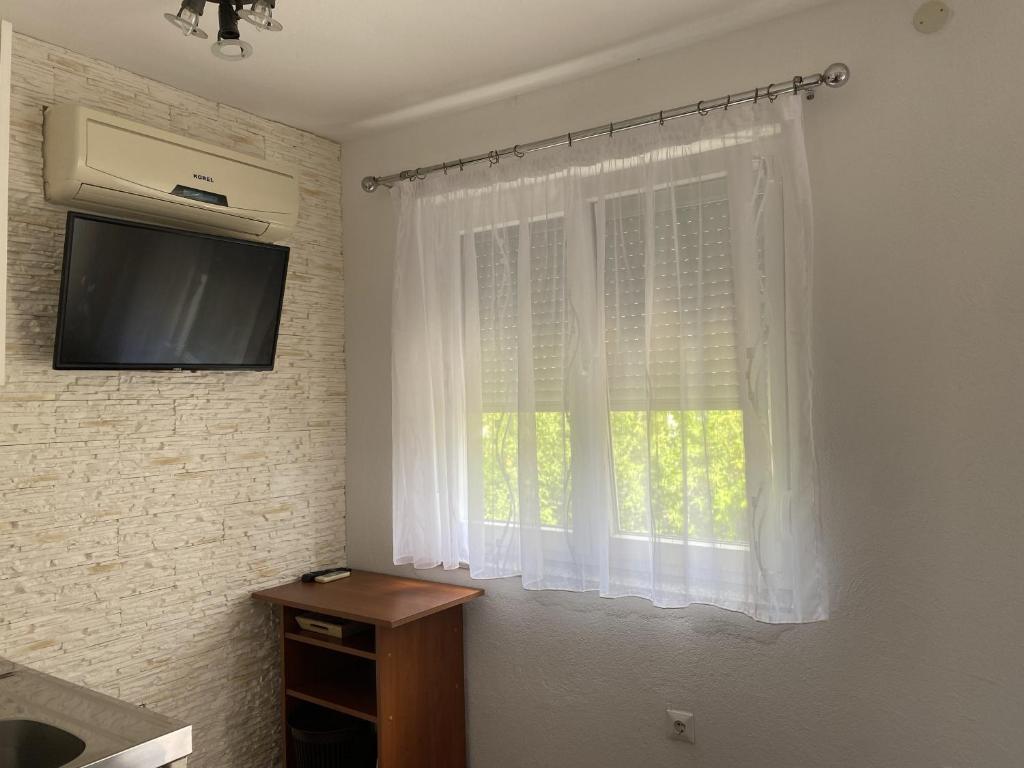 TV a/nebo společenská místnost v ubytování Villa Sekki