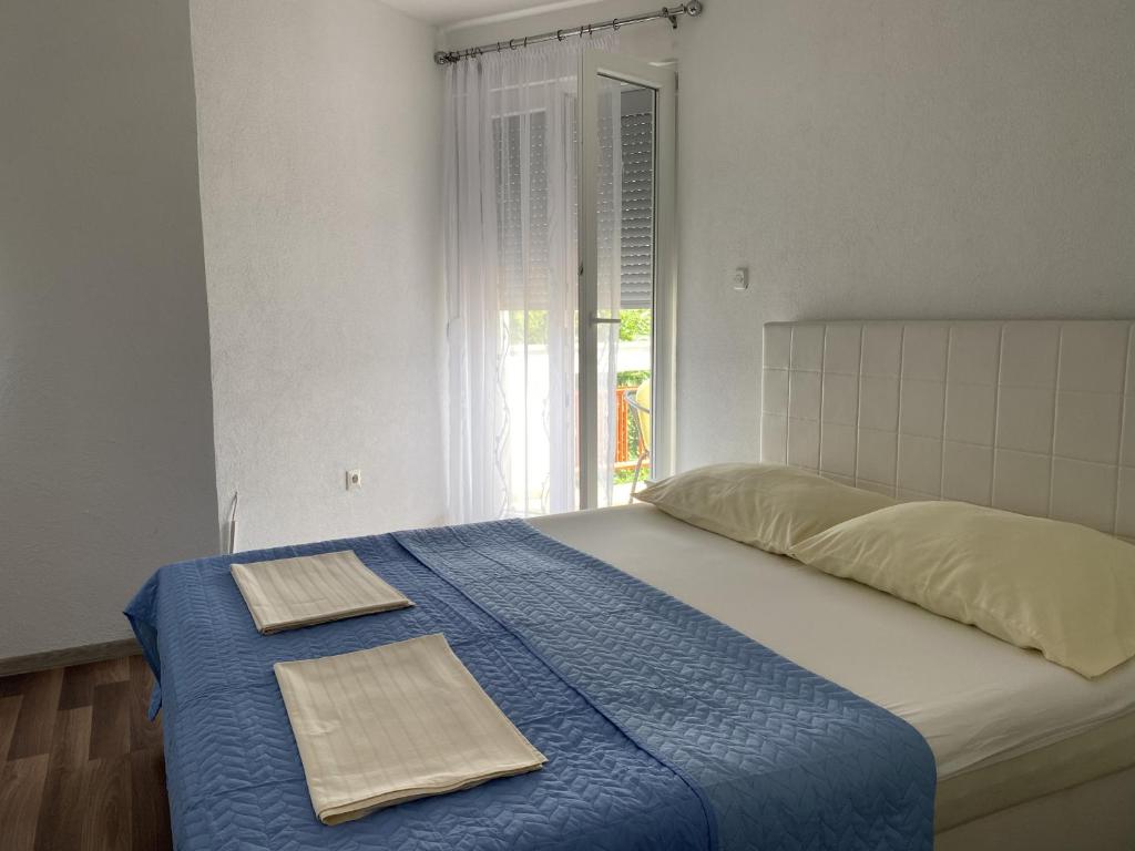 Postel nebo postele na pokoji v ubytování Villa Sekki