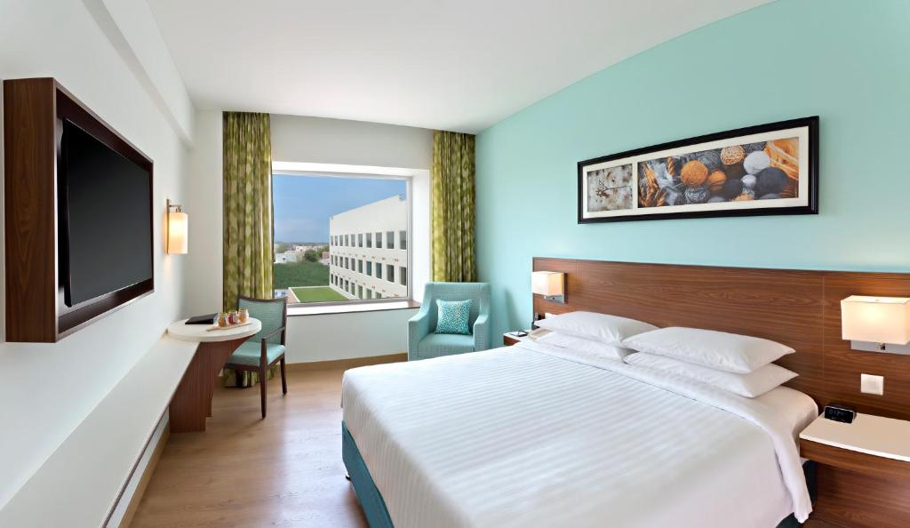 Postel nebo postele na pokoji v ubytování Fairfield by Marriott Coimbatore