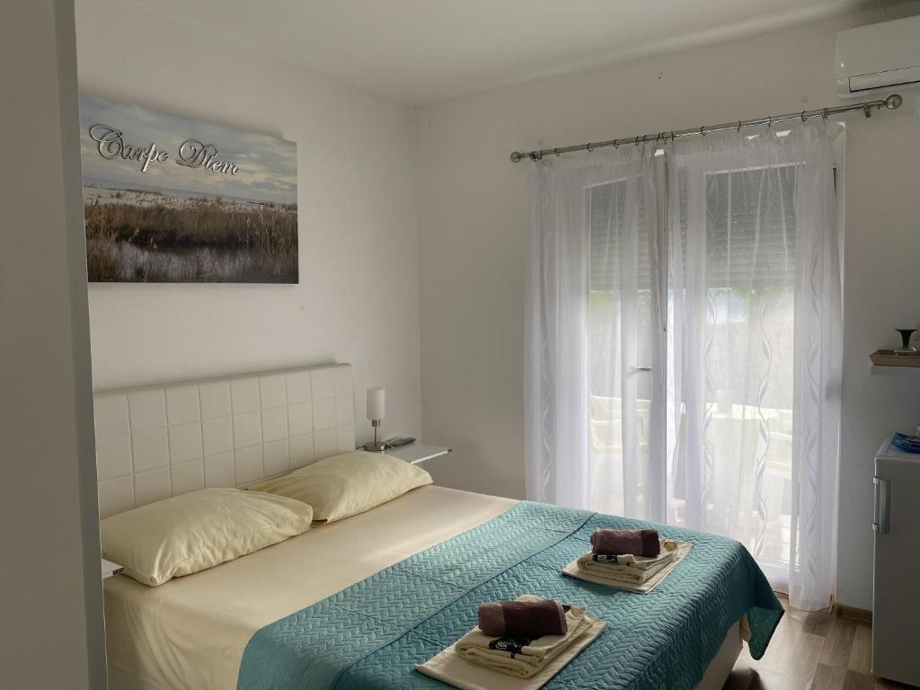 Postel nebo postele na pokoji v ubytování Villa Sekki