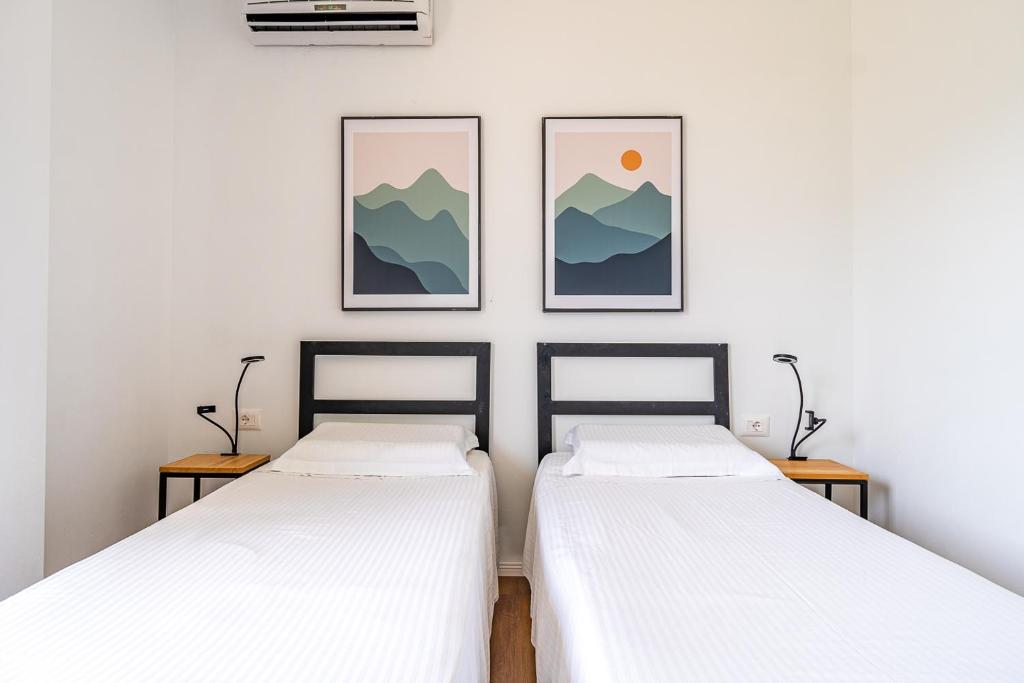 Postel nebo postele na pokoji v ubytování Bujtina Lumo & pool