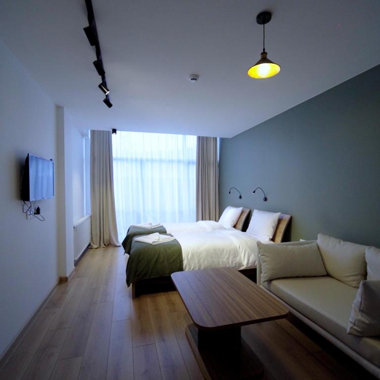 Letto o letti in una camera di Hotel 1700