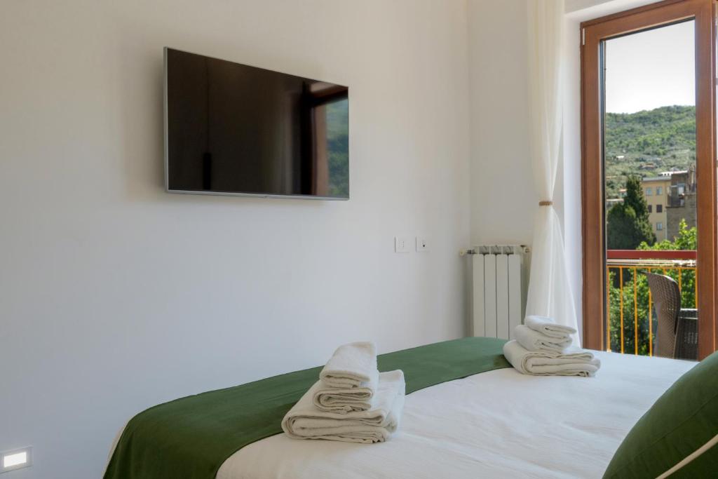 Postel nebo postele na pokoji v ubytování MIFRA SUITES