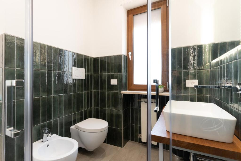 Koupelna v ubytování MIFRA SUITES