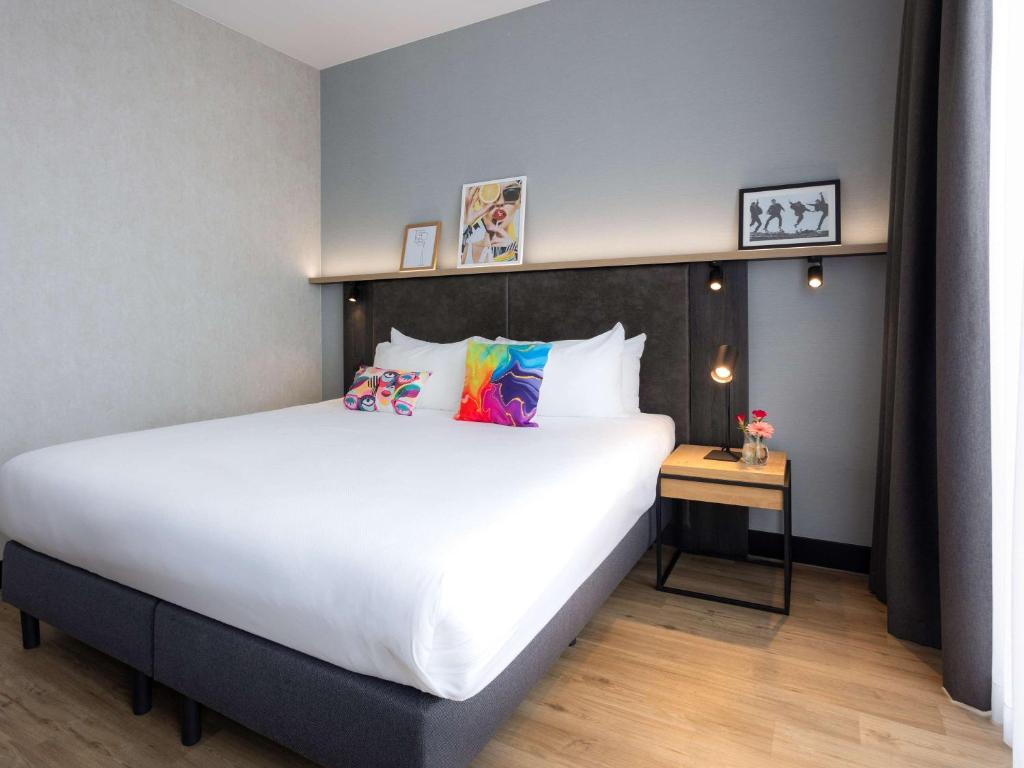 Postel nebo postele na pokoji v ubytování ibis Styles Den Haag Scheveningen