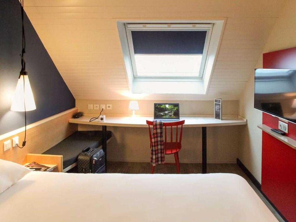 Postel nebo postele na pokoji v ubytování ibis Brest Kergaradec