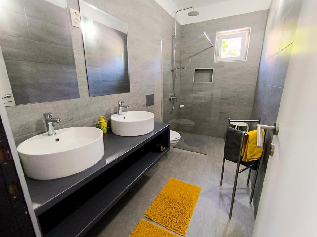 Koupelna v ubytování House Kapetanović