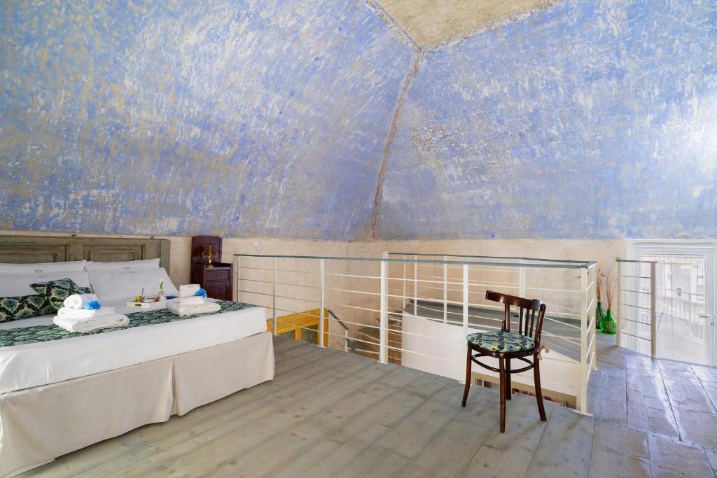 Un ou plusieurs lits dans un hébergement de l'établissement B&B Corte Kampanes