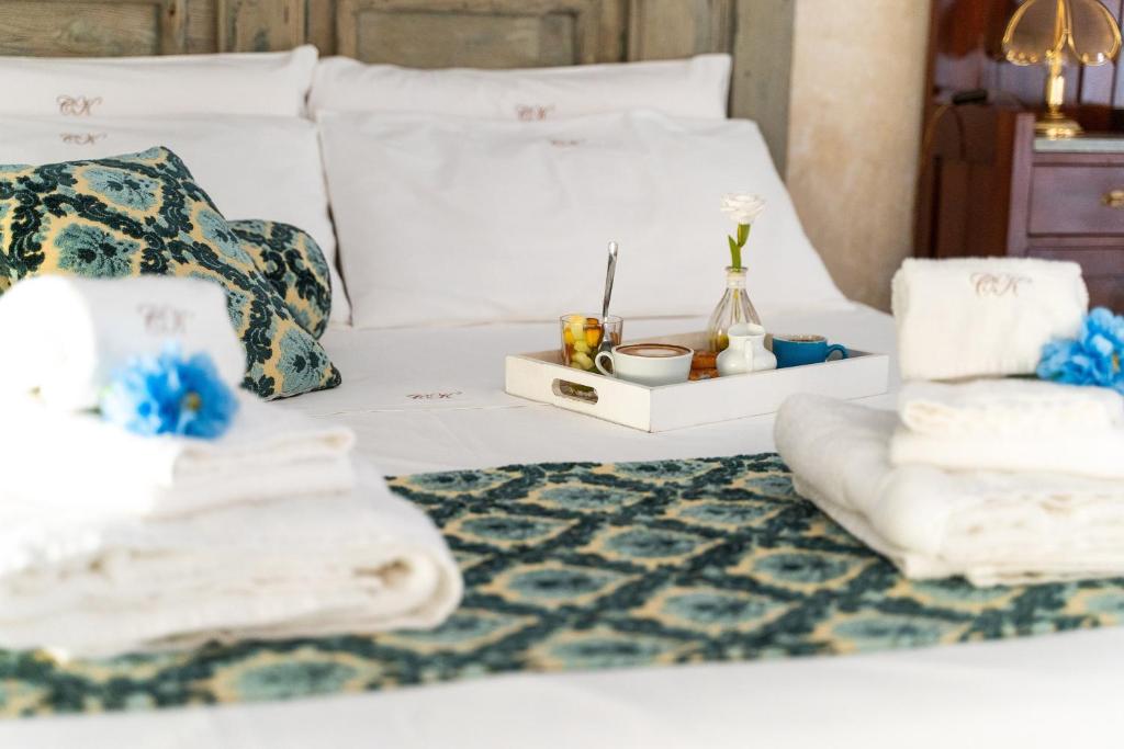 Un ou plusieurs lits dans un hébergement de l'établissement B&B Corte Kampanes