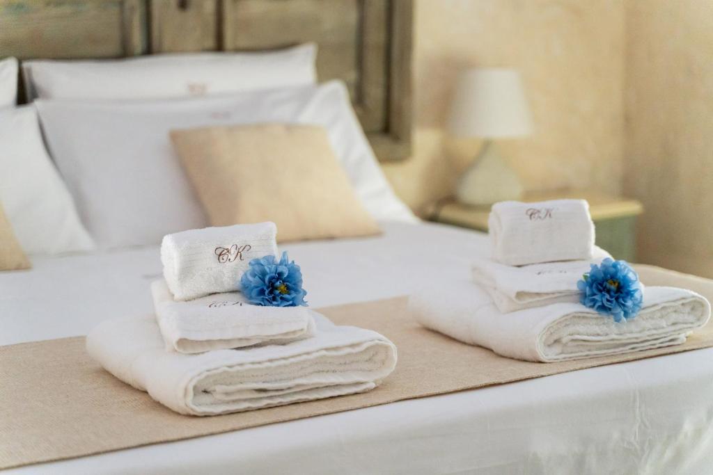 Un ou plusieurs lits dans un hébergement de l'établissement B&B Corte Kampanes