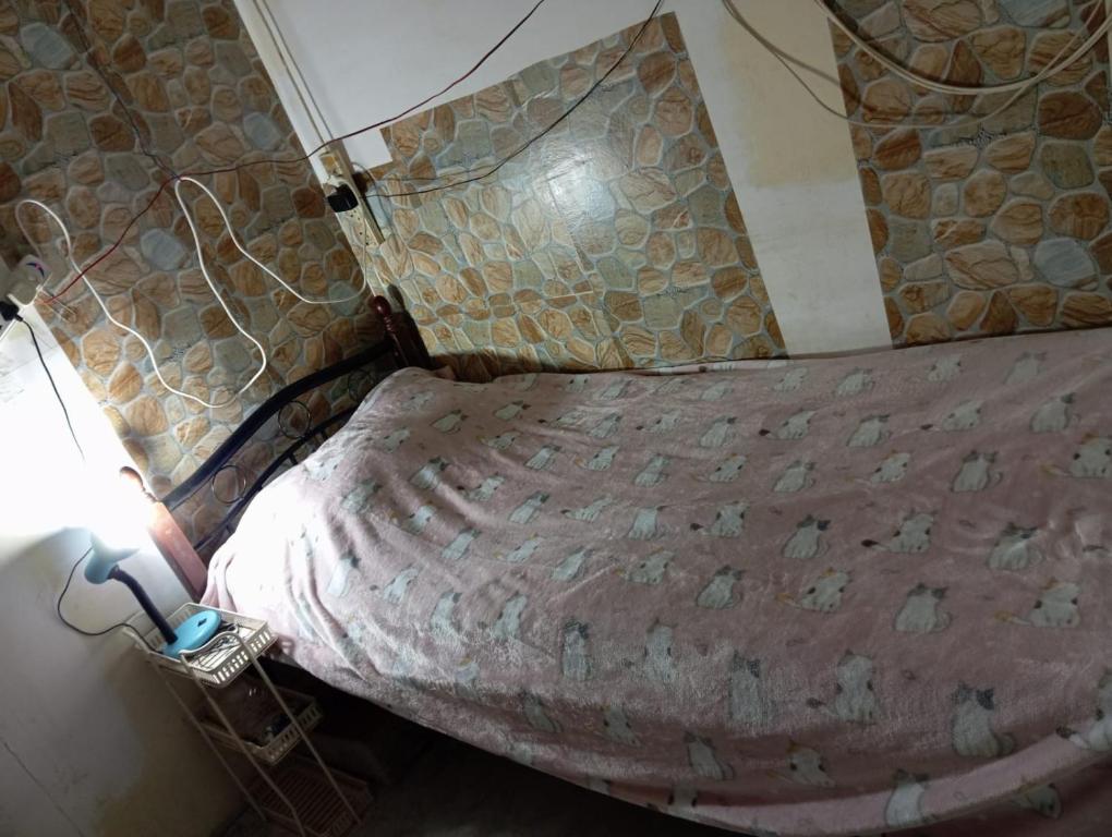 Postel nebo postele na pokoji v ubytování Single room hotel