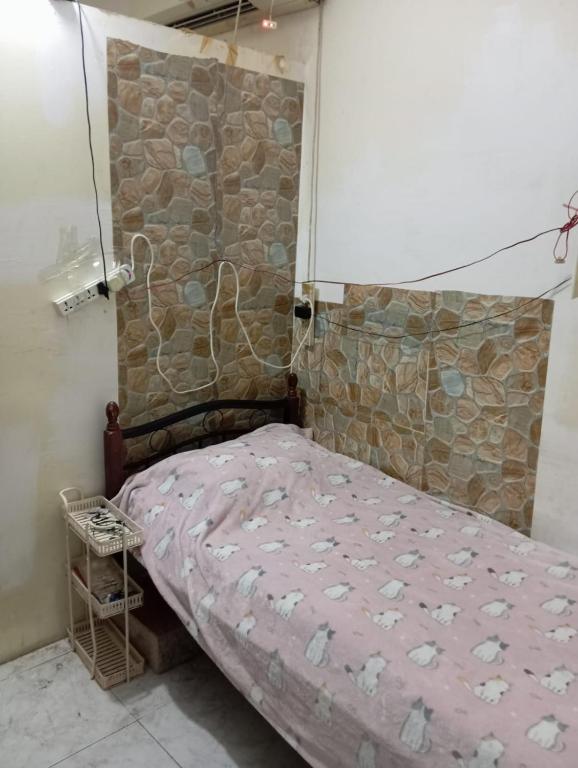 Postel nebo postele na pokoji v ubytování Single room hotel