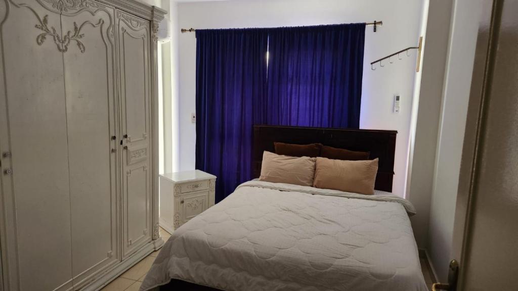 Postel nebo postele na pokoji v ubytování Madinty1