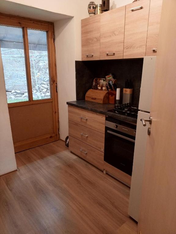 Kuchyň nebo kuchyňský kout v ubytování Chalupa pod hradem Talmberk
