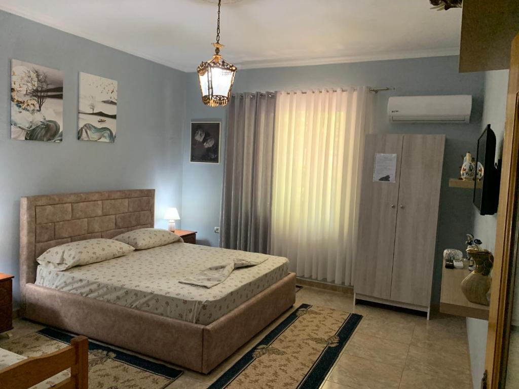 Postel nebo postele na pokoji v ubytování Vila Spaho