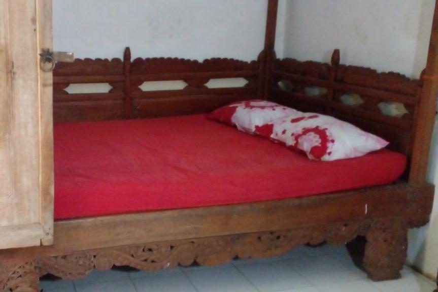 Postel nebo postele na pokoji v ubytování Omah Guyub
