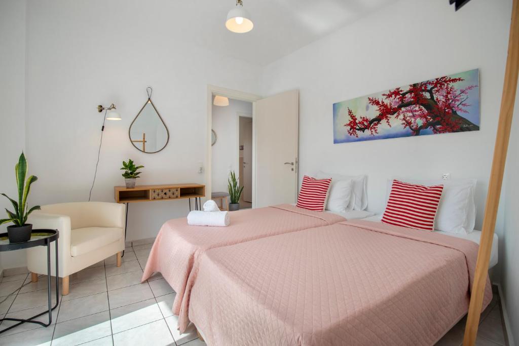 Postel nebo postele na pokoji v ubytování Babilia central appartment suites Limenas Hersonisou