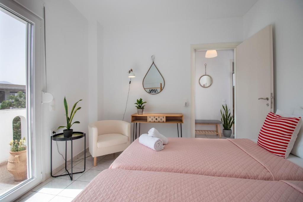 Postel nebo postele na pokoji v ubytování Babilia central appartment suites Limenas Hersonisou