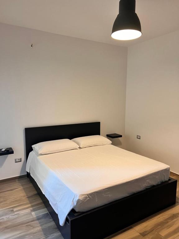 Postel nebo postele na pokoji v ubytování Dimora 85