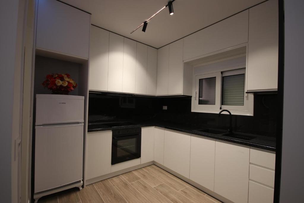 Kuchyň nebo kuchyňský kout v ubytování Klea Rooms