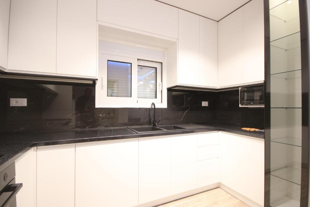 Kuchyň nebo kuchyňský kout v ubytování Klea Rooms