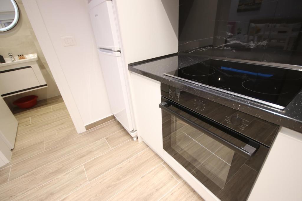 Kuchyň nebo kuchyňský kout v ubytování Klea Rooms