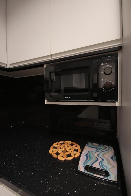 Kuchyň nebo kuchyňský kout v ubytování Klea Rooms