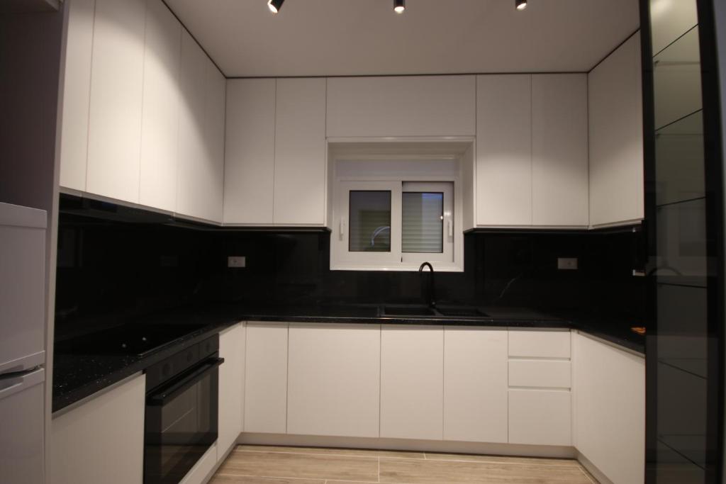 Kuchyň nebo kuchyňský kout v ubytování Klea Rooms