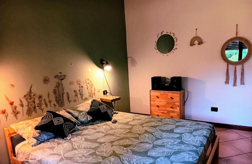 Postel nebo postele na pokoji v ubytování LaelleApartament Rho Fiera San Siro