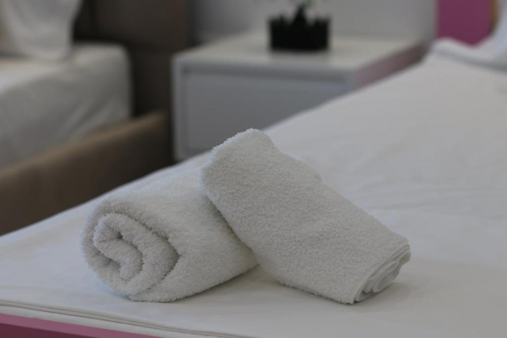 Postel nebo postele na pokoji v ubytování Klea Rooms