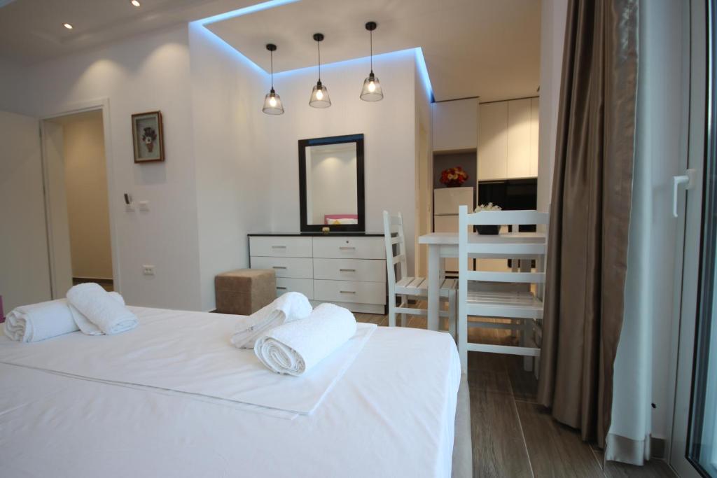 Postel nebo postele na pokoji v ubytování Klea Rooms
