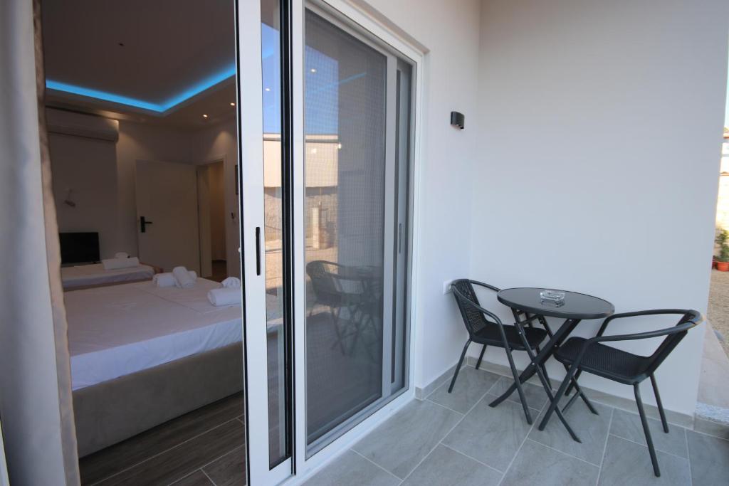 Postel nebo postele na pokoji v ubytování Klea Rooms
