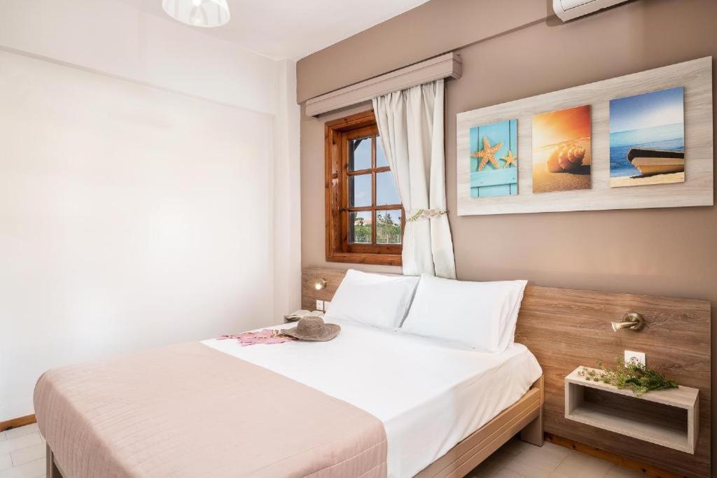 Postel nebo postele na pokoji v ubytování Cathrin Suites