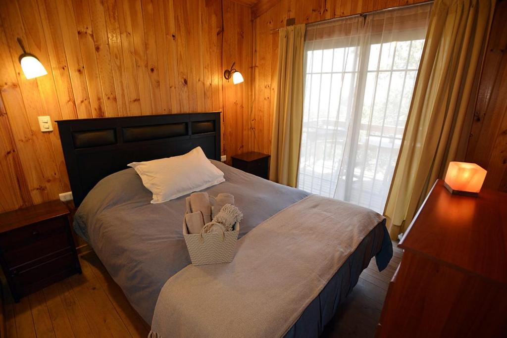 Postel nebo postele na pokoji v ubytování Las lomitas de Guayacan, Cabañas y Spa