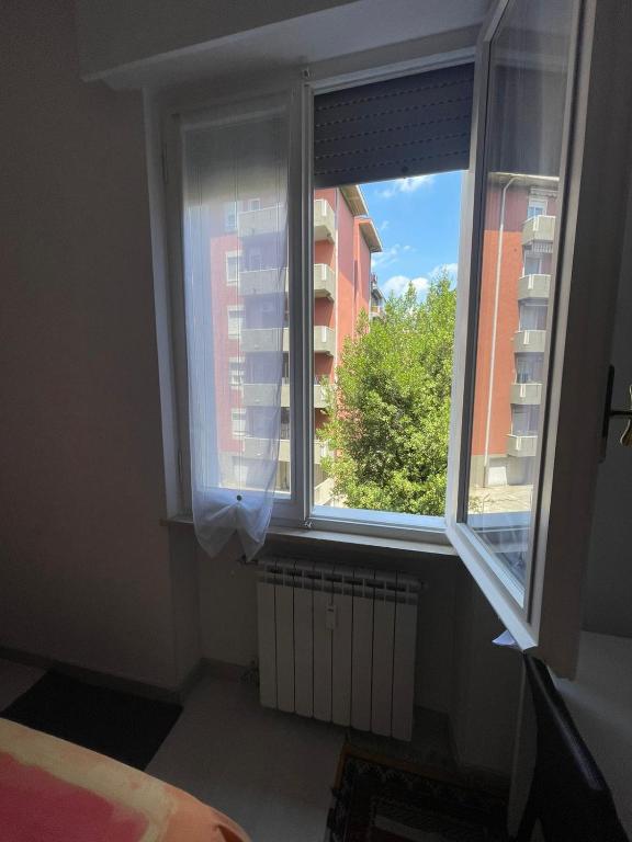 Postel nebo postele na pokoji v ubytování Fiera-Nemo