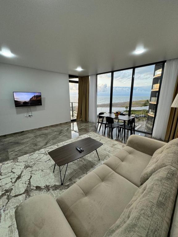 Гостиная зона в Tropical garden apartments