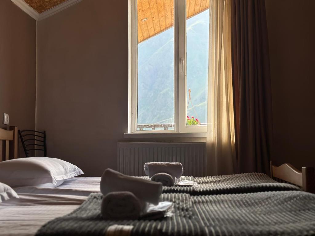 Rúm í herbergi á Hotel Dari