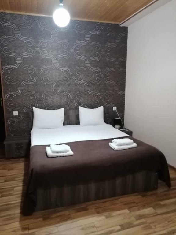 Postel nebo postele na pokoji v ubytování Hotel Svanseti