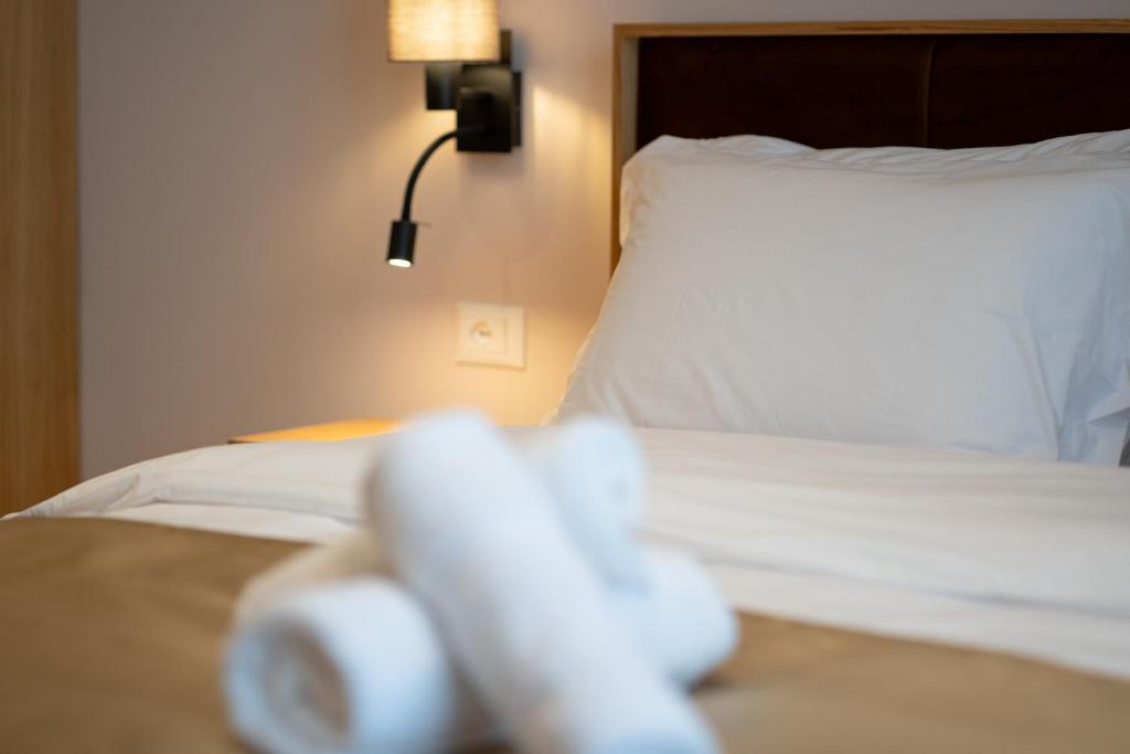 Postel nebo postele na pokoji v ubytování Hotel Boutique Jera