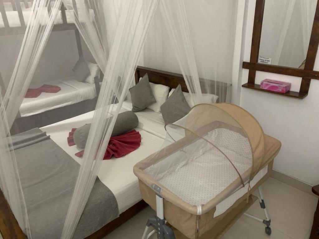 Postel nebo postele na pokoji v ubytování Seven Heaven