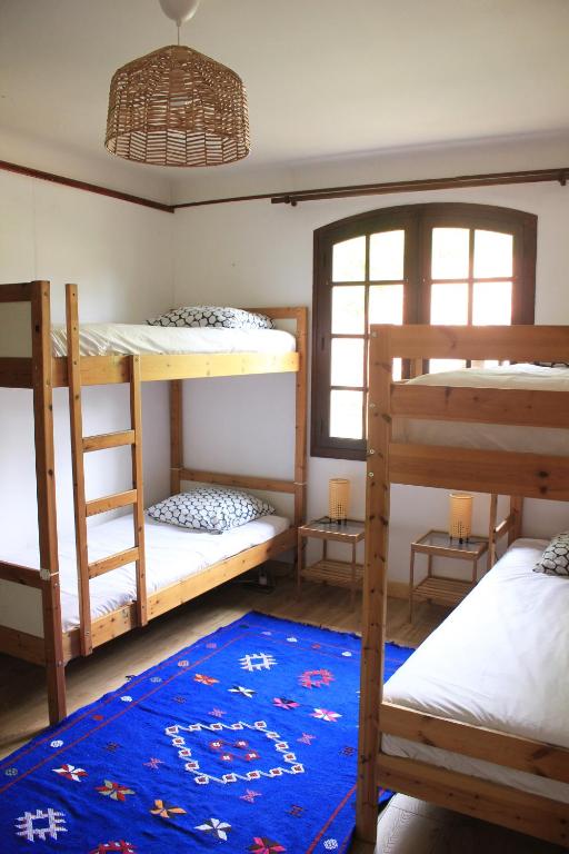 Postel nebo postele na pokoji v ubytování Yacumama Guesthouse