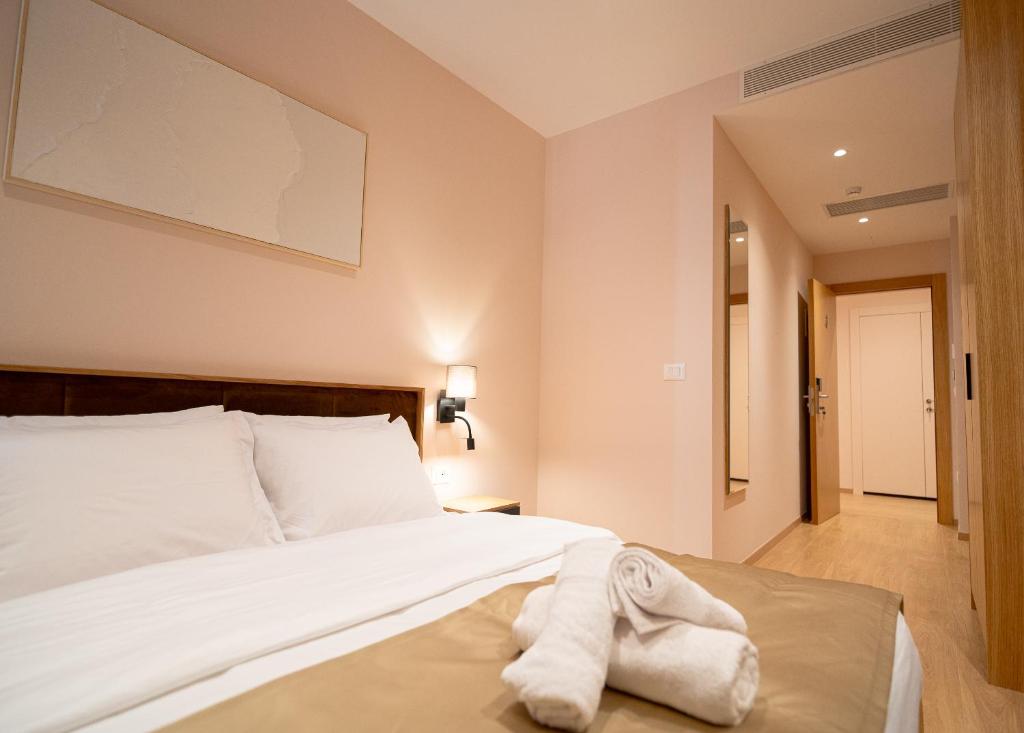 Postel nebo postele na pokoji v ubytování Hotel Boutique Jera